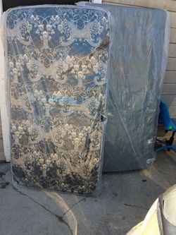 New twin mattress with box spring and railing