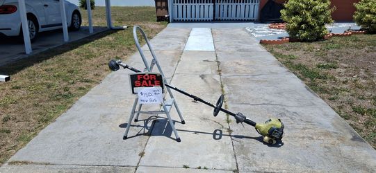 RYOBI TRIMMER $125. NEW PARTS GOOD WORK RUN