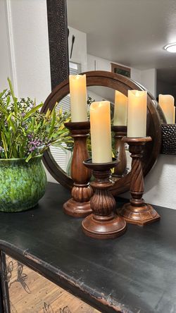 Set a three wooden candlesticks