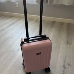 Small Pink carry-on suitcase