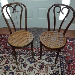 Two antique cane chairs with new cane seat bottoms