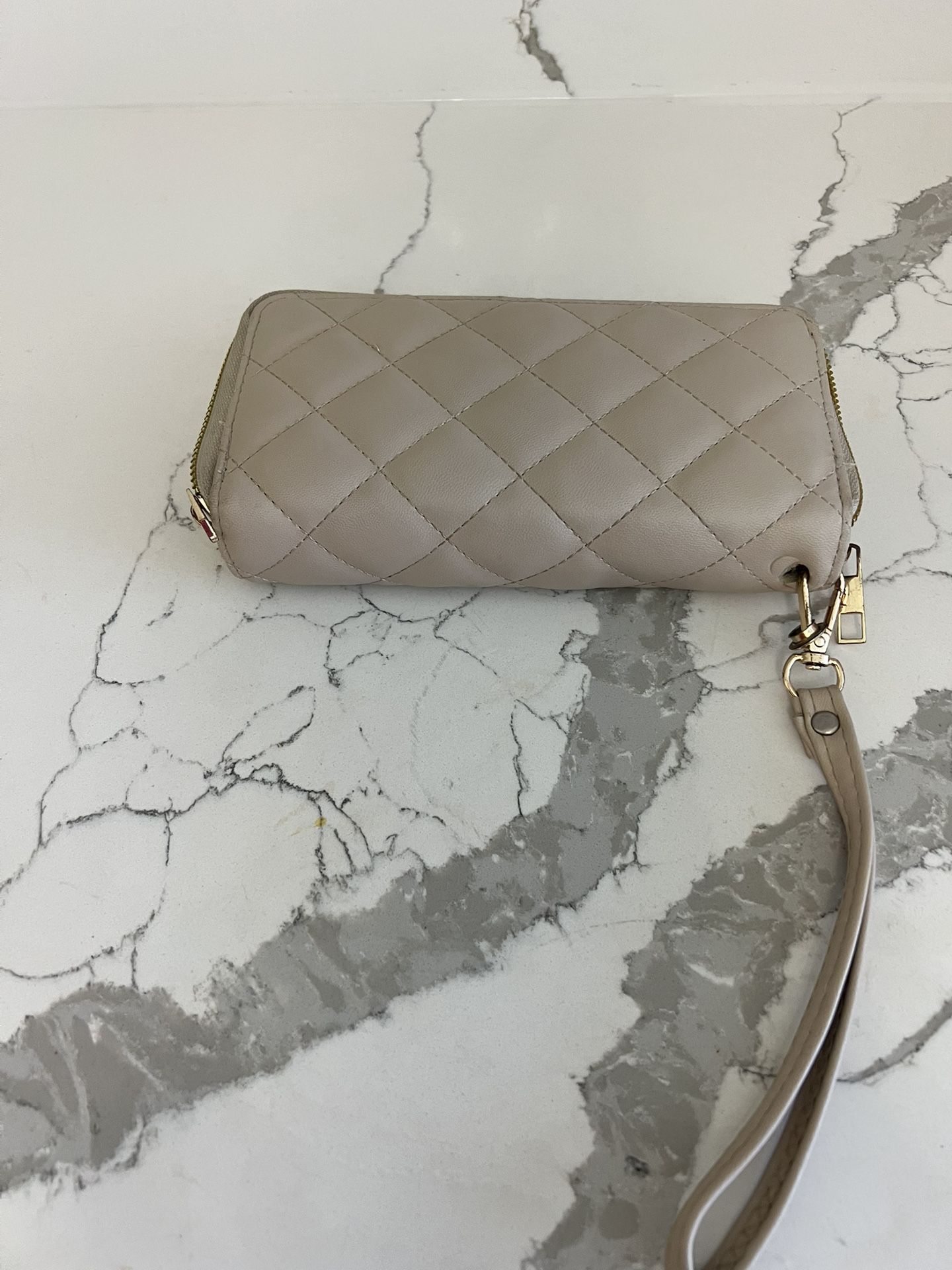 Beige Wallet Zipper From Inside is Broken Other Then That Great Condition