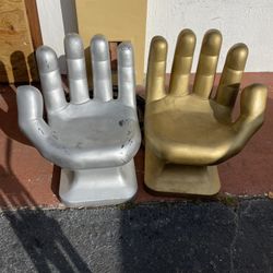 Pair Of Hand Shaped Chairs