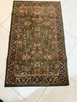 Dark green area rug