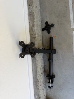 dual-monitor desk mount with adjustable arms.