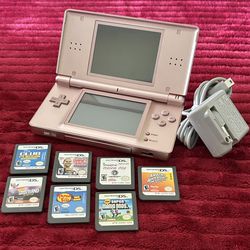 Rose Gold Nintendo DS Lite with 7 games, complete with stylus, and charger. $65