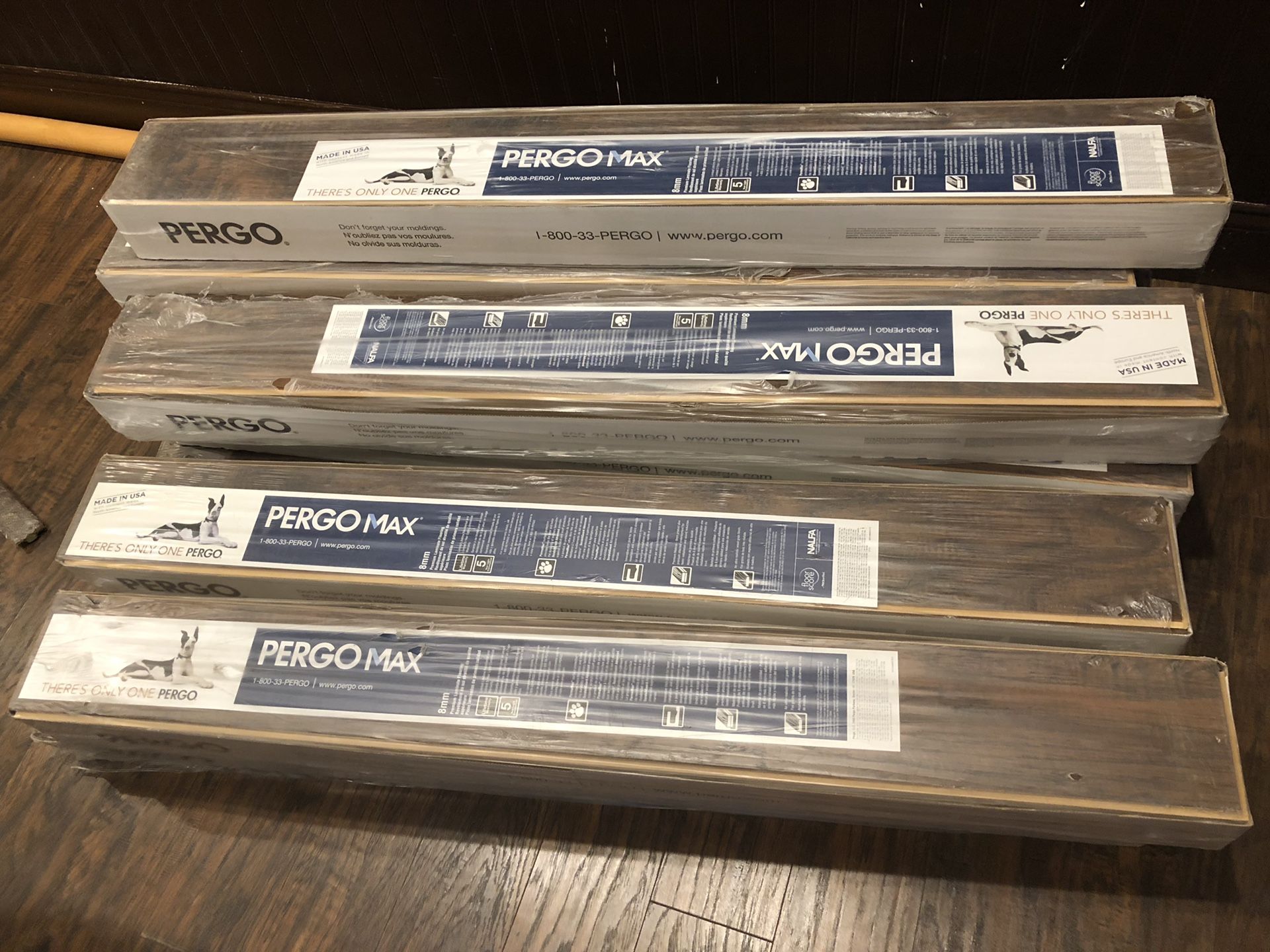Pergo Max: Hand Scraped “Manor Hickory” flooring. 10 planks per box. 11 boxes