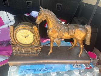 Antique horse clock
