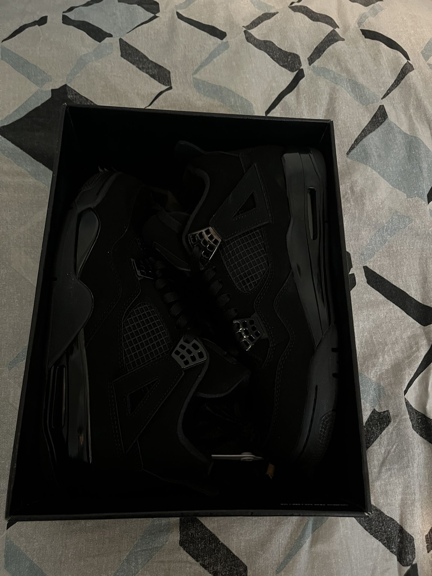 Black cats jordan 4s