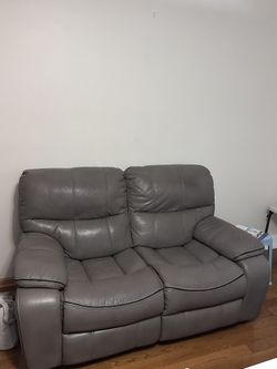 Used loveseat With Power Adjustable Leg Extension