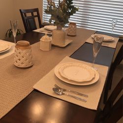 Dining Table With Four Lather Chairs& It’s Staff