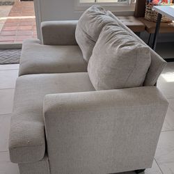 Beige love seat
