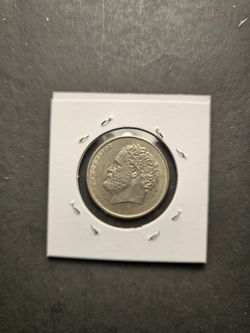 The product is a circulated 1976 Greek 10 Drachmas coin made of copper-nickel. This vintage coin from Greece features a denomination of 10 Drachmas 