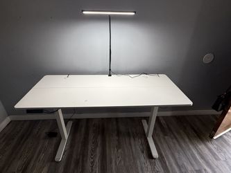 Adjustable height desk