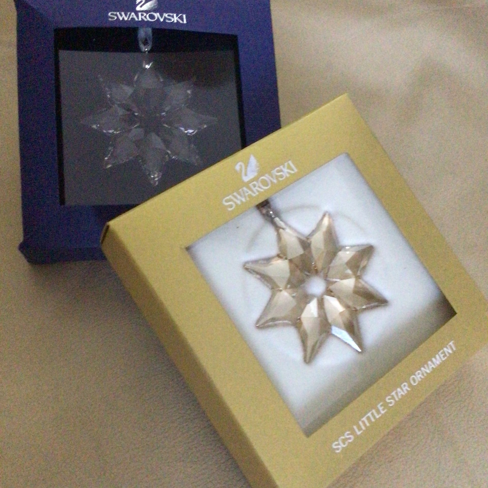 Swarovski Little Star and Little Star SCS Edition Ornaments still in the box with certificate of authenticity (COA)