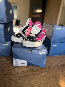8)pink pearlized vans ($150)