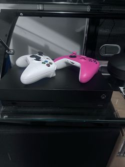 XBOX ONE X WITH 2 CONTROLLERS AND GAMES