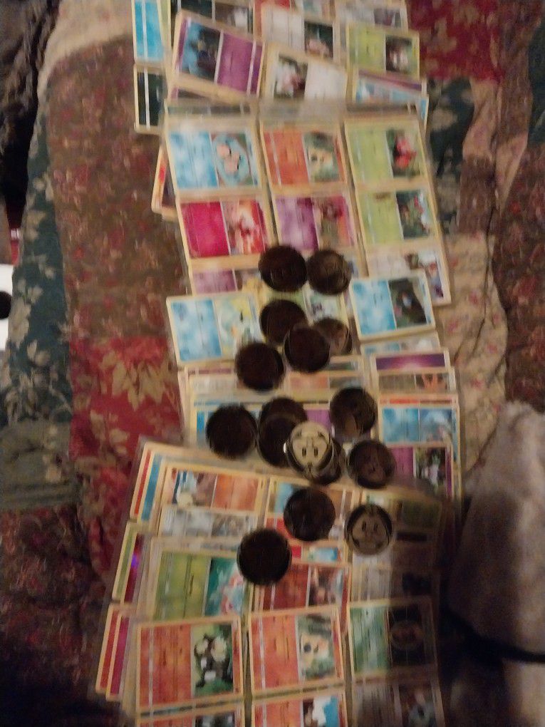 I got sleeves of Pokemon cards and Pokemon coins  whole set 