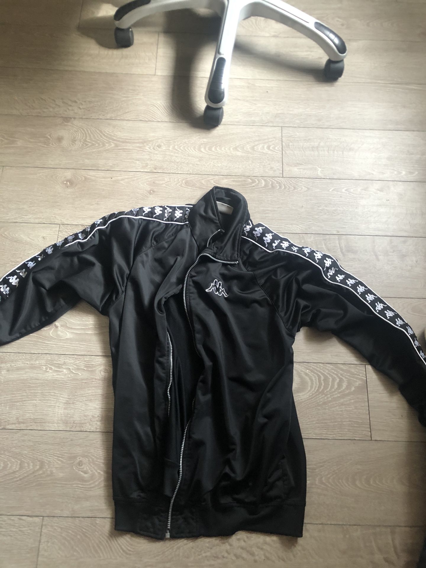 Kappa black track jacket size XL but can fit L