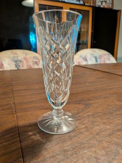 This is a Waterford Crystal footed vase, likely in the Kilbarry pattern. 7 inches tall.