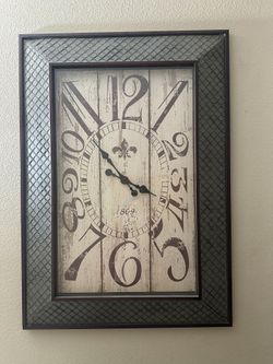 wood wall clock with mesh pattern 34 " W x 1 " D x 48 " H.