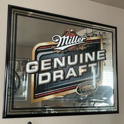 Vintage MGD framed Mirror.