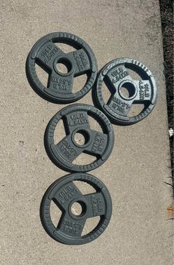 (4) 10lb weight plates (2 inch)