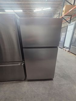 Whirlpool refrigerator top freezer 33 Stainless steel new