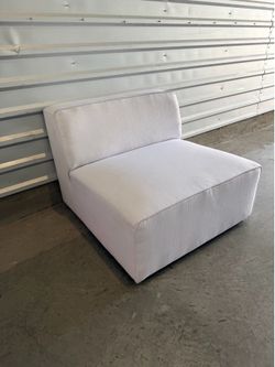 White armless chair
