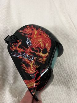 Auto darkening weld helmet.   New on box