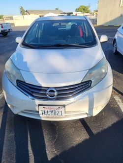 Nissan versa 2014 millas 126,123 titulo limpio placas diciembre 2026 correct excelente,