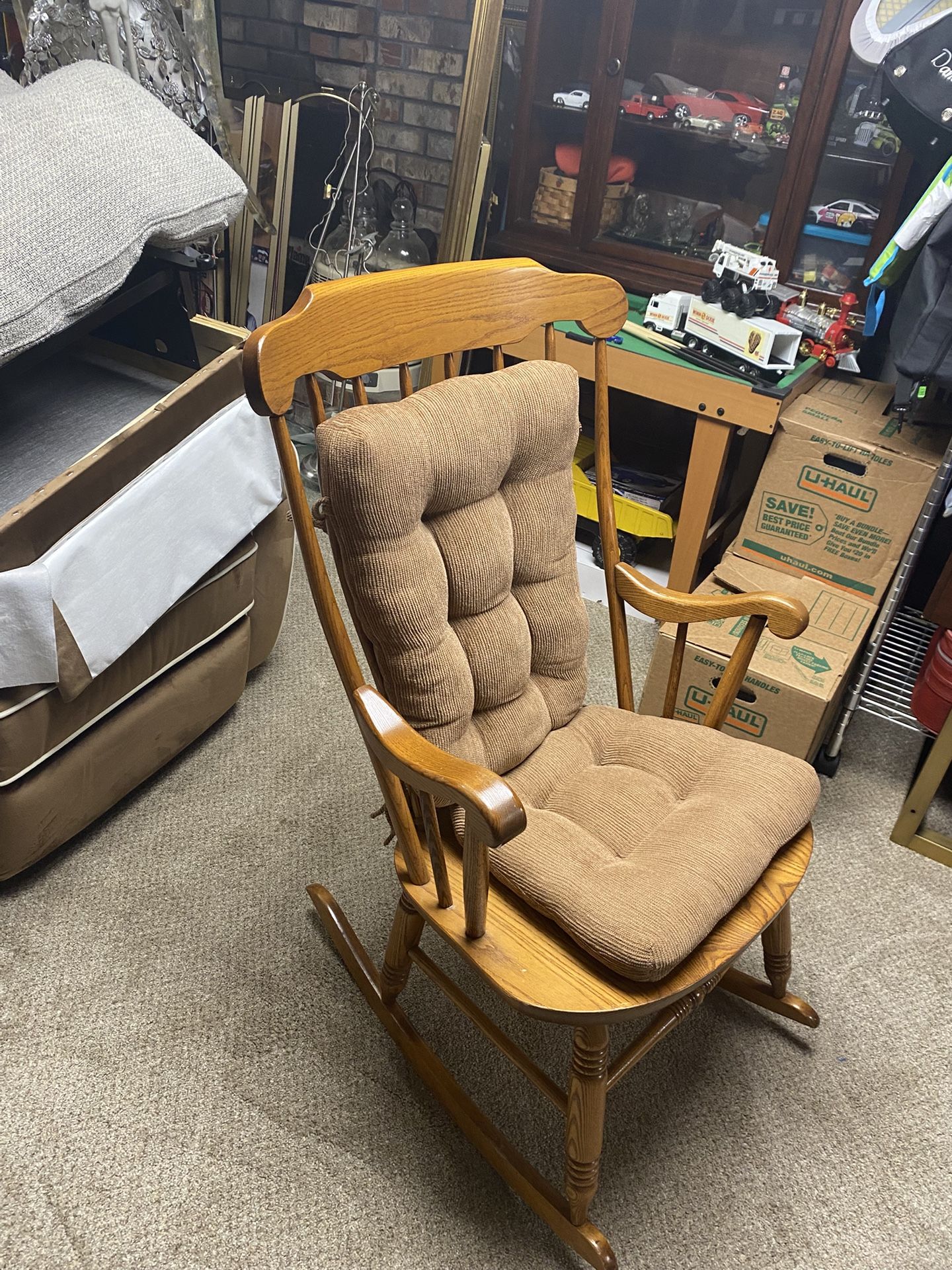 Wooden rocking chair with cushion