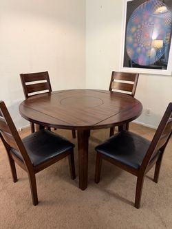 Round or square dark wood dining table with chairs
