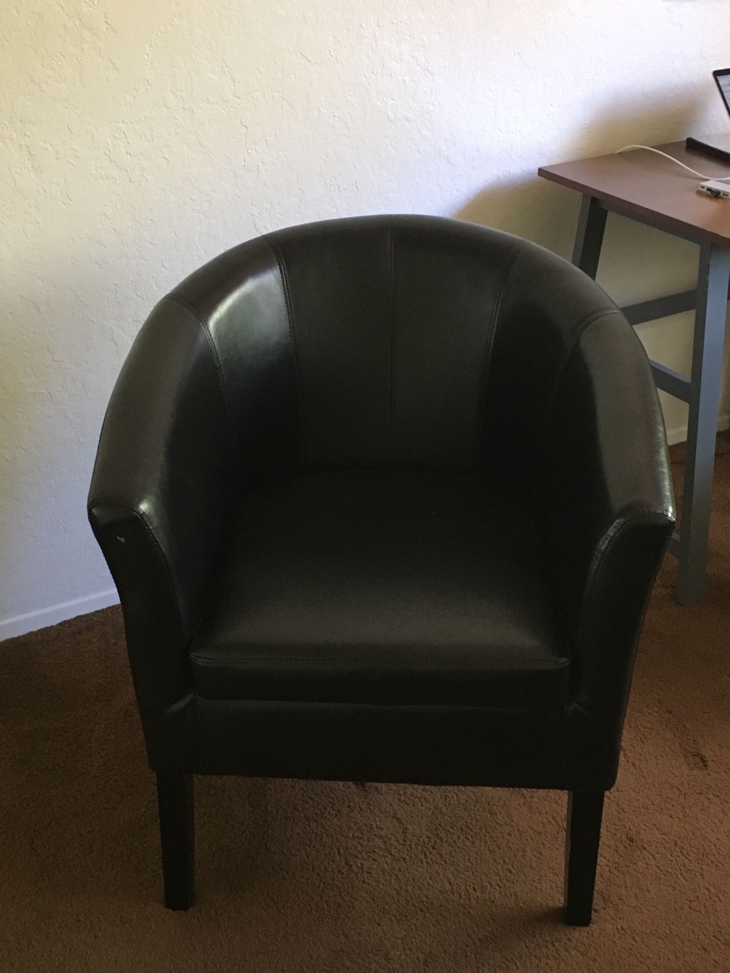 Black leather accent chair