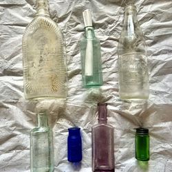 Set Of 7 Antique Bottles