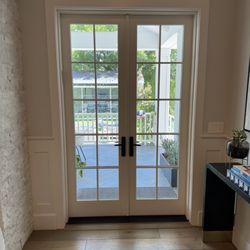 Milgard wood clad swing out French doors 5’x8’  