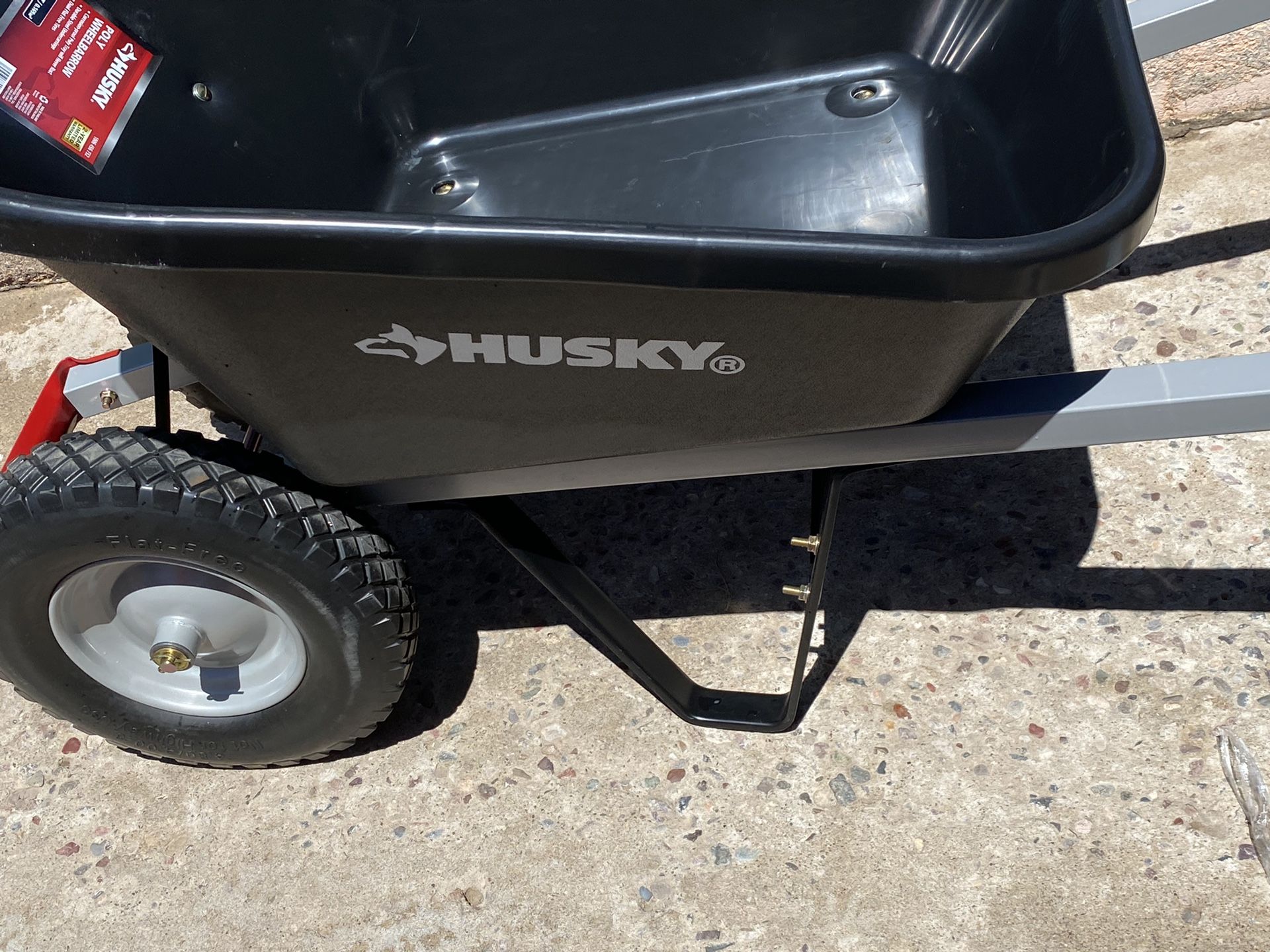 Husky , Wheelbarrow Dual Flat free Tires Steel Arms Poly Bucket