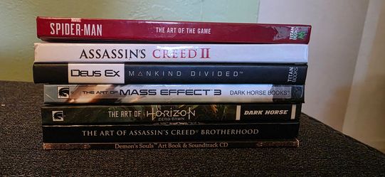 Collection of video game collectors edition art books.