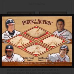 Action' memorabilia card from the 2000 SP Game Bat Milestone Edition features four legendary Atlanta Braves players