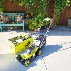 Ryobi ONE+ 18V 13 in. Cordless Battery Walk Behind Push Lawn Mower with 4.0 Ah Battery and Charger.(Open box never used)