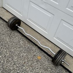 Ez curl bar with 100 bls weights