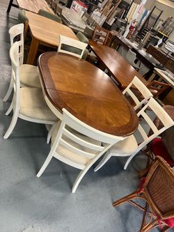 Oval cream colored dining table and chairs set (in store)