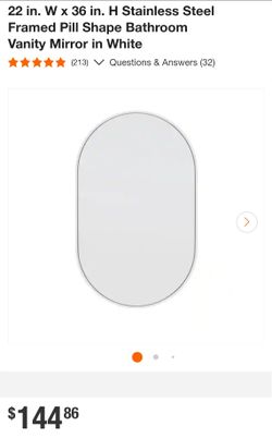22 in. W x 36 in. H Stainless Steel Framed Pill Shape Bathroom Vanity Mirror in White
