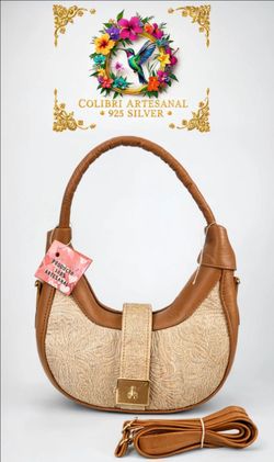Bolso Artesanal de piel grabada chico.