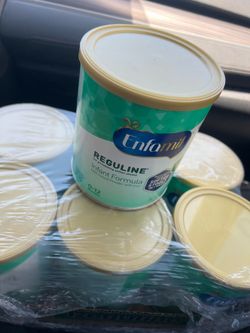 enfamil reguline (7 cans total)
