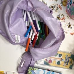 Markers and watercolors plus coloring books