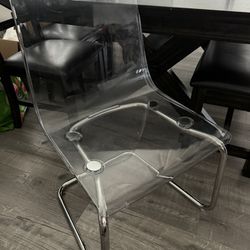 ikea acrylic chair . desk chair . sitting chair 