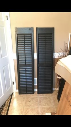 Black vintage wood outdoor or indoor shutters . Size 15 “ w x 5’3”