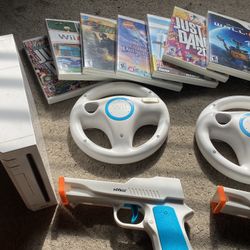 Wii  System With Controllers  And Games