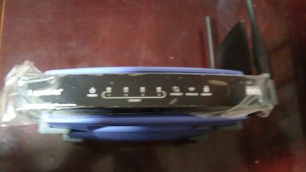 ROUTER WIRELESS WRT300N V1 LINKSYS 4 PORT BRAND NEW